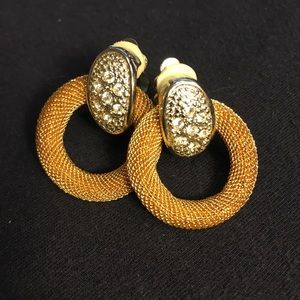 Faux diamond and gold clip-on earrings.